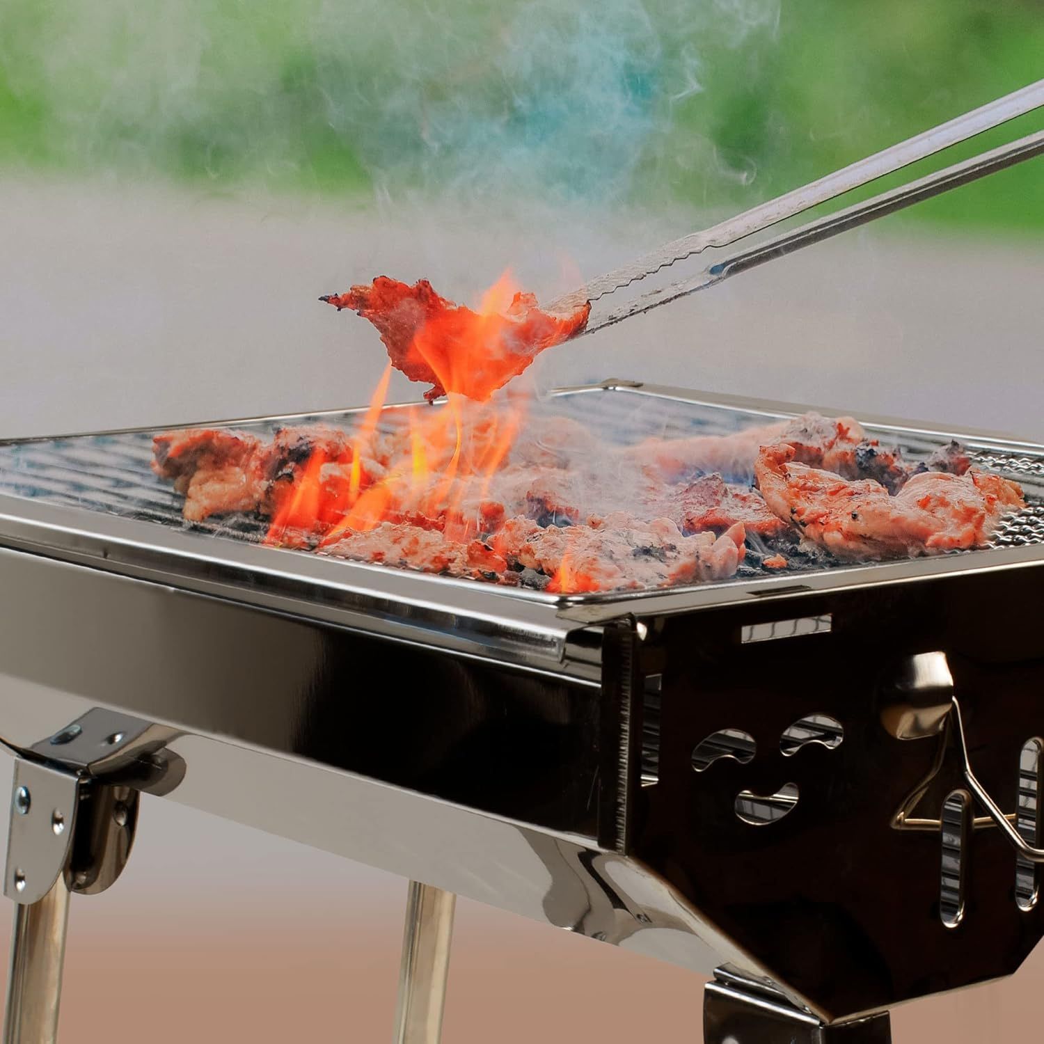 Mellemstor kulgrill med foldbare ben